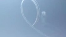 La Patrulla Águila dibuja un crespón en el cielo en La Manga (Murcia)