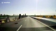 Tyre smashes into car on Chinese highway after falling off truck