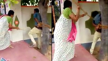 పోకిరిని కర్రతో కుళ్లబొడిచారుగా..! || Roadside Romeo Tied To Tree And Hurted By Couple || Oneindia
