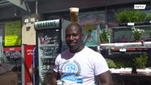 Refugee and Schalke fan fights racism by cycling with beer on his head