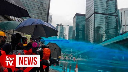 Barricade burnt as Hong Kong protest heats up