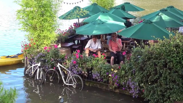 Pub-goers stranded in beer garden by tidal flooding in west London