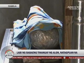 Woman swept away by river found dead