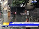 VP Binay takes amphibian to flooded Makati