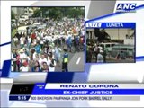 Corona heckled by anti-pork protesters