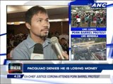 Pacquiao denies he is losing money