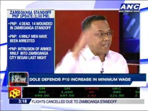 DOLE defends P10 wage hike