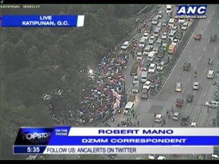 Anti-pork protesters march to Katipunan