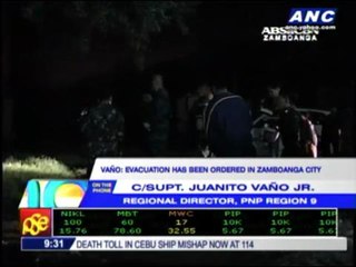 Скачать видео: MNLF rebels hold civilians hostage in Zamboanga City