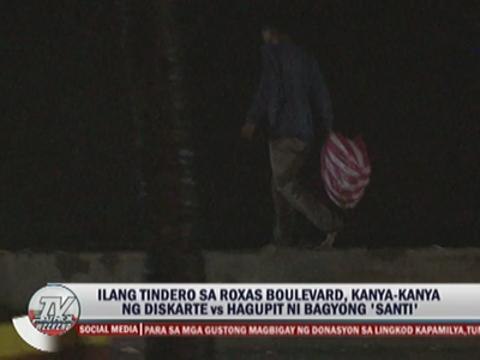 Manila Bay storm surge dumps trash on Roxas Blvd