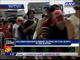 WATCH: Looters steal fuel from Tacloban gas station