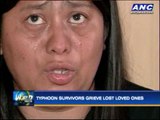 Typhoon survivors grieve over lost loved ones