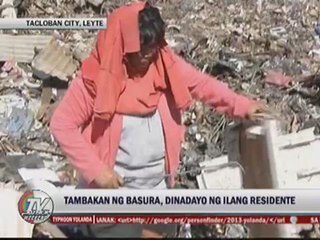 'Yolanda' survivors scavenge for food, clothes