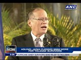 Aquino back home from Japan