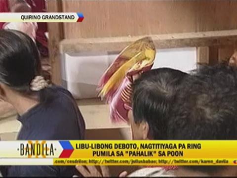 Devotees line up for 5-second encounter with Black Nazarene