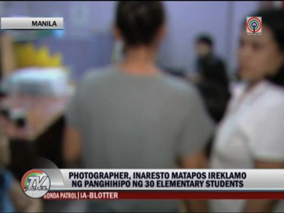 Photographer accused of molesting 30 students