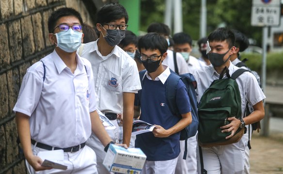 Hong Kong students boycott class on first day of school as police patrol MTR stations