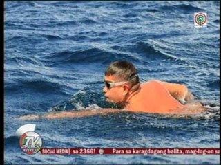 Pinoy lawyer-triathlete completes Surigao Channel swim