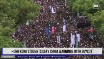 Hong Kong students defy China warnings with boycott
