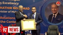 PM receives honorary fellowship award from Royal University of Phnom Penh