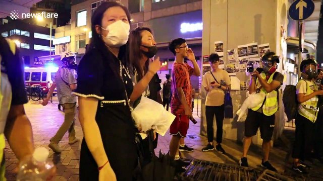 Touching moment young women beg for less violence and remind police that they are also Hong Kong citizens