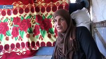 عائلة نازحة تحول حافلة قديمة إلى مسكن لها على الحدود التركية