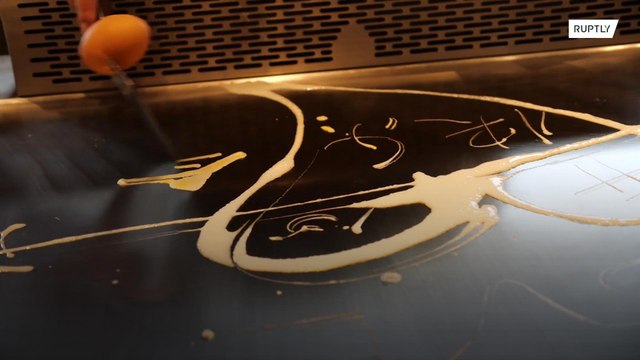 Chinese chef proves that cooking is art with his egg painting skills