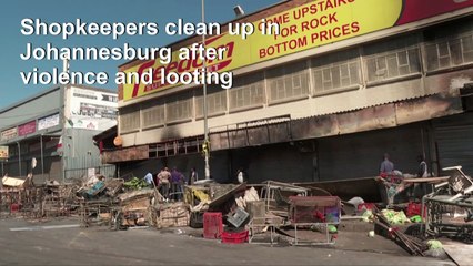 Tải video: Shopkeepers clean up after xenophobic attacks in South Africa