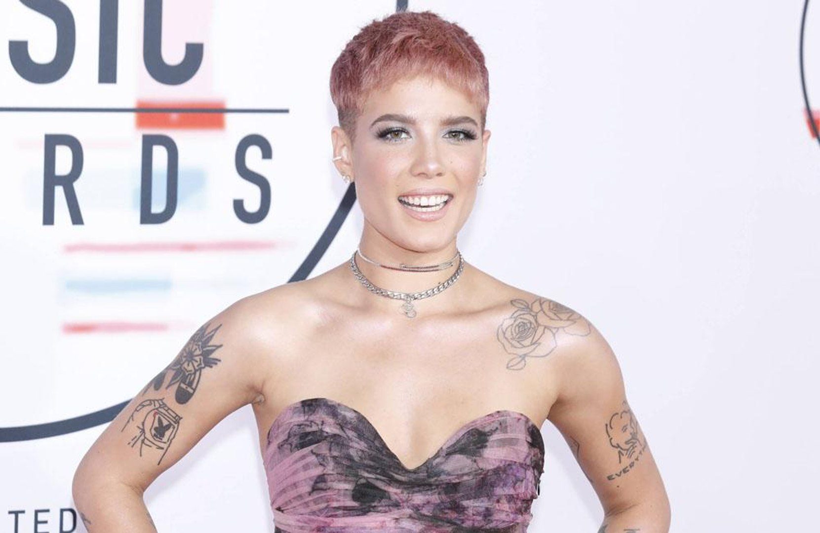 ⁣Halsey helped by music