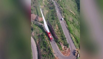 Chinese truck makes dramatic delivery of huge wind turbine blade