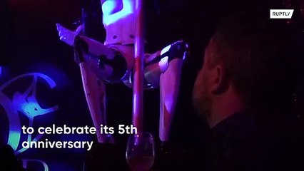 Robots cause stir as they pole dance at French club