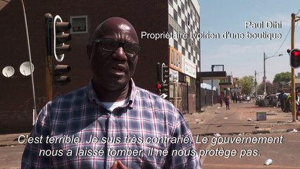 Des commerçants réagissent après les pillages à Johannesburg