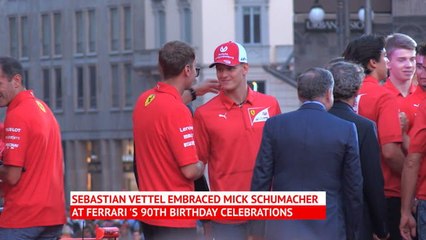 Schumacher Jr embraces Vettel at Ferrari celebration