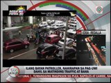 WATCH: Commuters struggle as rains flood Metro Manila