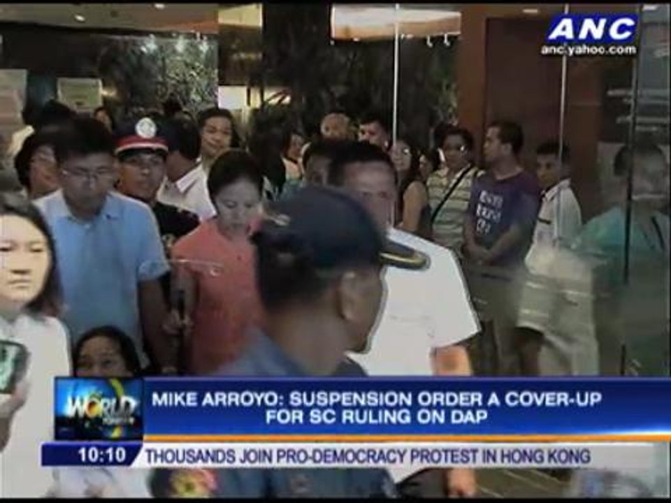 Detained Arroyo suspended from office