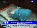 Baby wrapped in gabi leaves abandoned by roadside