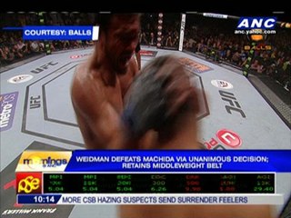 Weidman outpoints Machida to retain title