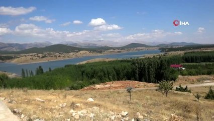 Arazileri baraj suları altında kalan köylüler için yapılan evler teslim edildi