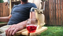 Woodworker builds chairs with massagers and beer dispensers