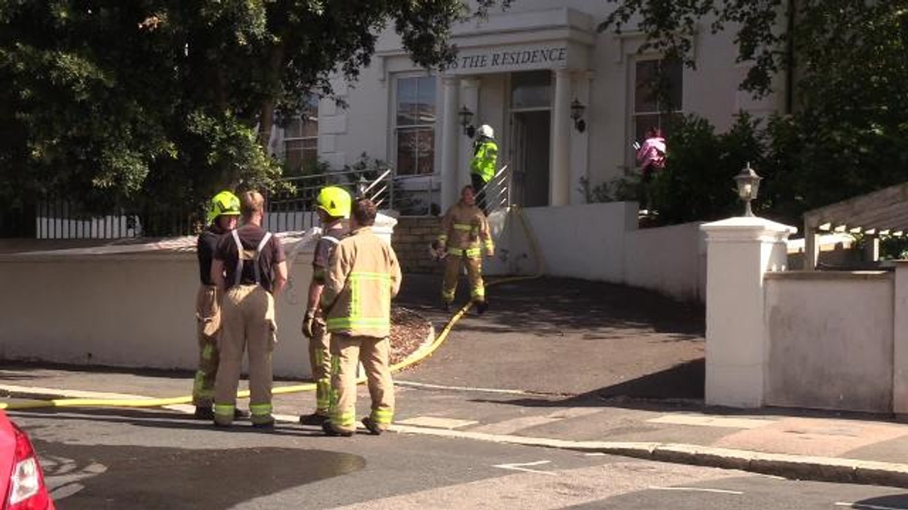 Firefighters work at the scene