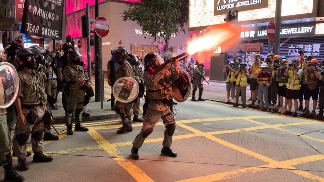 Sunday protests spiral into chaos as police and demonstrators clash in the heart of Hong Kong