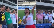 Des supporters japonais chantent l'hymne sud-africain