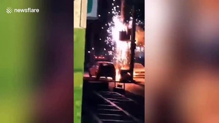 Faulty voltage transformer explodes sending sparks onto Chinese street