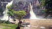 Waterfall floods after heavy monsoon rainstorms in Thailand