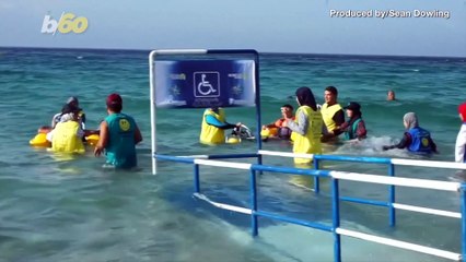 Disabled Swimmers Have a Beach Day Thanks to Tricked Out-Equipment