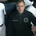 Baseball - 2001 : Less than 2 months after the 911 attacks, George Bush throws a perfect strike with a bulletproof vest on before game 3 of the World Series