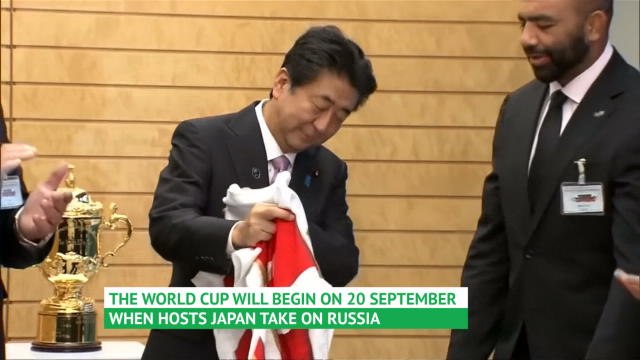 Japan PM greets World Rugby execs