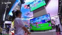 Visitors test official video game of Tokyo 2020 Olympics at Japanese gaming event