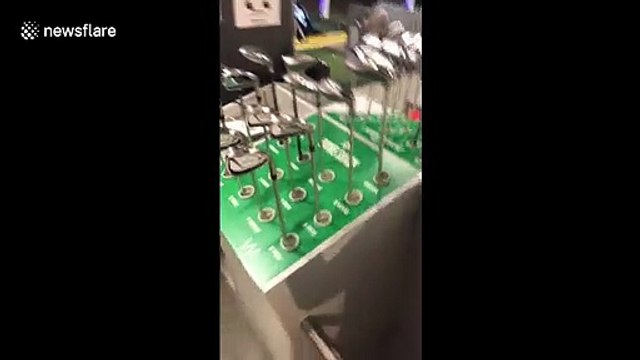 Heads up! North Carolina golfer nails bouncing shot but ends up launching driver head at friend filming