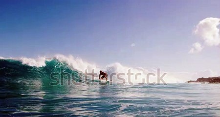 ＠　ノアパブリッシメント　stock-footage-surfer-riding-and-turning-with-spray-on-blue-ocean-wave-surfing-ocean-lifestyle-extreme-sports